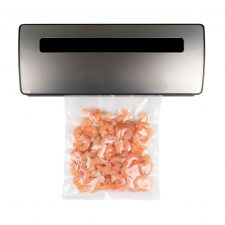 Vacuum,Packer,Machine,With,Shrimps,In,A,Plastic,Bag,Isolated