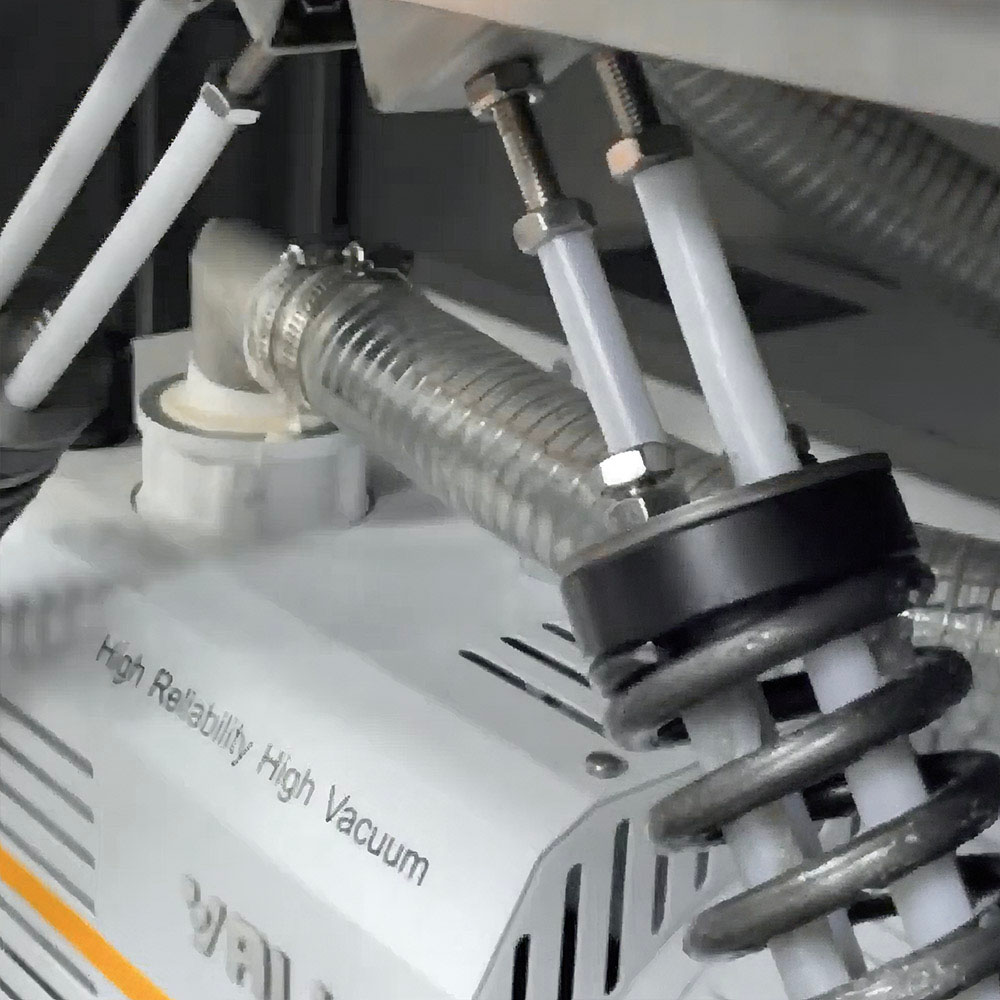 The top nut of the lid spring on the Vac610 has been loosened.